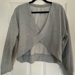 Grey crew neck sweat shirt with open back detail